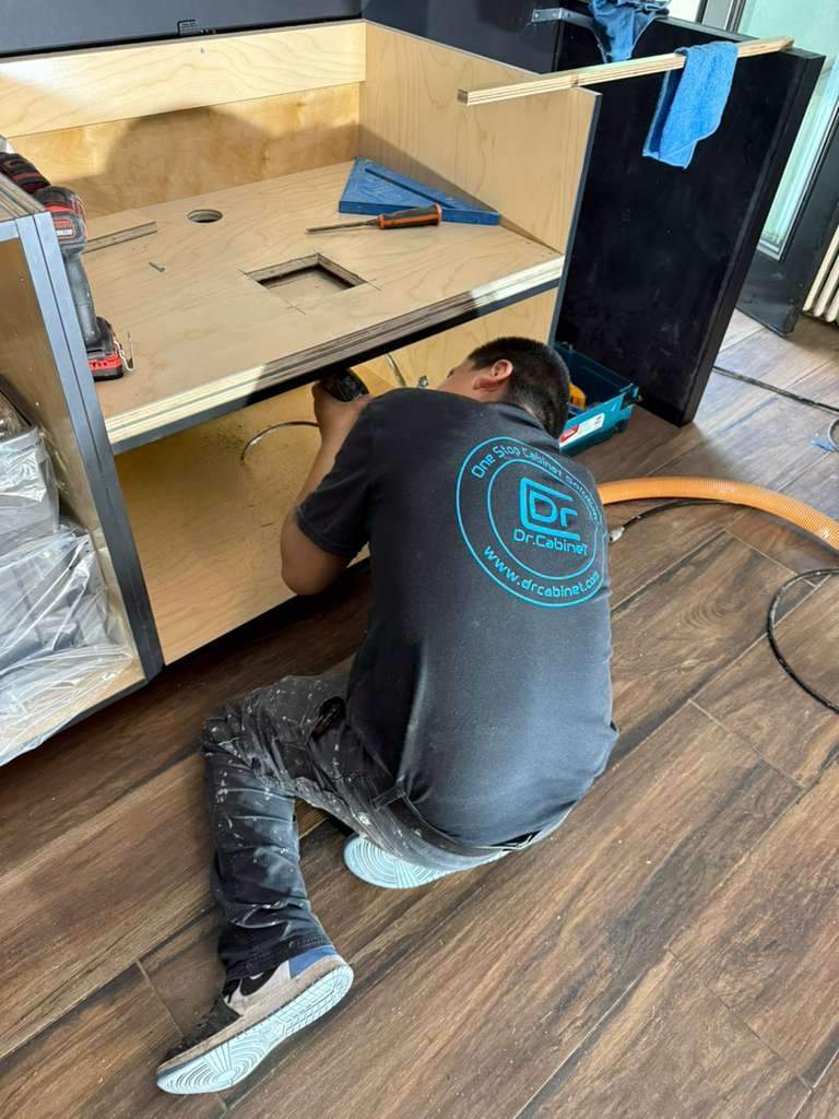 Kitchen cabinet fitting, in progress